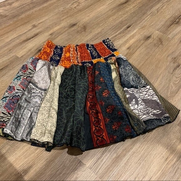 Bold patterned shorts. Says one size on tag but fits best on small. - Picture 1 of 4